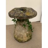 Straddle stone with weathered patina