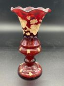 A Victorian Ruby glass hand blown vase, hand painted with grape vine detail