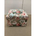 A small square ottoman