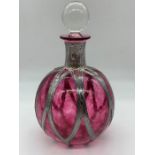 Bohemian glass scent bottle and stopper with a silver mesh wrap