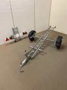 Single collapsible motorbike trailer, ramp and brake light board