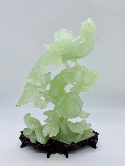 A Chinese jade figure of pheasants, birds and flowers