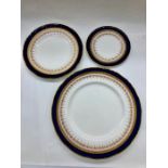 A selection of Royal Worcester Regency cobalt blue plates to include nine dinner plates (27.5cm),