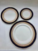 A selection of Royal Worcester Regency cobalt blue plates to include nine dinner plates (27.5cm),