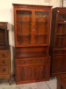 A 1980's display cabinet/dresser with internal lighting by Beresford and Hicks of England