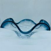 A Low Wave glass vase with a blue/grey rim