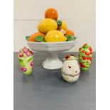 A ceramic table display piece of lemons and oranges, along with three china decorative pots by