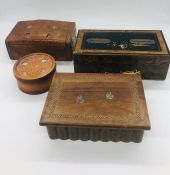 A selection of three wooden boxes and a lockable money box with key