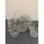 A large selection of glassware to include vases, bowls, glasses etc