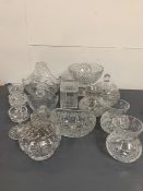 A large selection of glassware to include vases, bowls, glasses etc