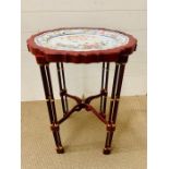 A Franklin Mint platter with wooden stand