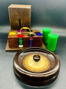 A Bakerlite Roulette Wheel and oak case of gambling chips.