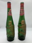 A Pair of Decorative Monkey Themed Wine Bottles