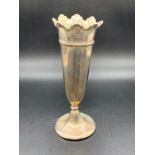 A Silver single stem vase with indistinct hallmarks.