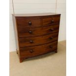 A three over two mahogany chest of drawers on bracket feet (H104cm D50cm W103cm)