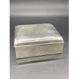 A Sterling Silver Cigarette Box, marked Sterling to base.