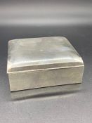 A Sterling Silver Cigarette Box, marked Sterling to base.