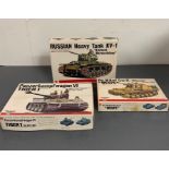 Three boxed army tank's model kits by Bandai