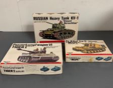 Three boxed army tank's model kits by Bandai