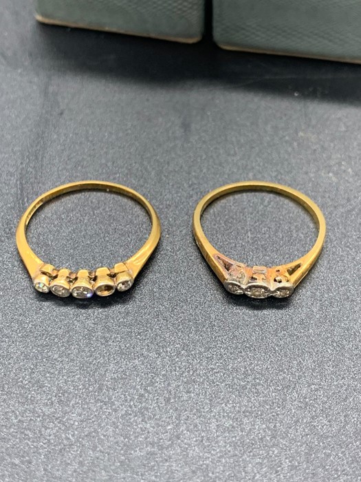 An 18 gold ring with missing stone (1.74g) and a three stone gold and platinum ring (2 g) - Image 2 of 3