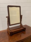 A mahogany dressing table mirror