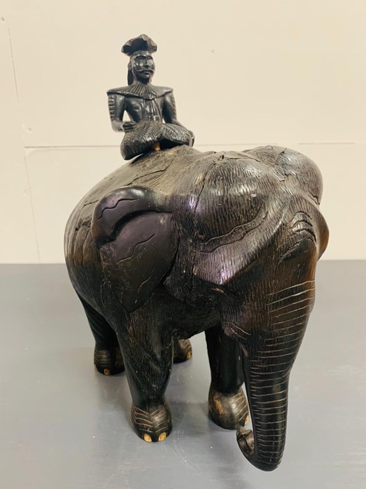 An Ebony Elephant with Mahut
