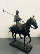 A Bronze of a Polo player on horse, with a 1930's appearance, signed to plinth.