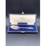 A Boxed Hallmarked silver Garrard & Co Silver spoon.