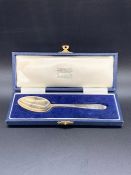 A Boxed Hallmarked silver Garrard & Co Silver spoon.