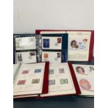 A Selection of Royal Themed Stamps in Albums with some coin covers etc.