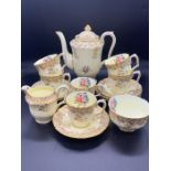 A Crown Staffordshire bone china tea service to include, teapot, milk jug etc