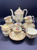 A Crown Staffordshire bone china tea service to include, teapot, milk jug etc