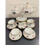 A Richard Ginori "Italian Fruit" tea service to include, teapot, sugar bowl, milk jug, six cups