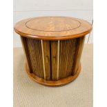 A circular drum occasional table