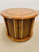 A circular drum occasional table