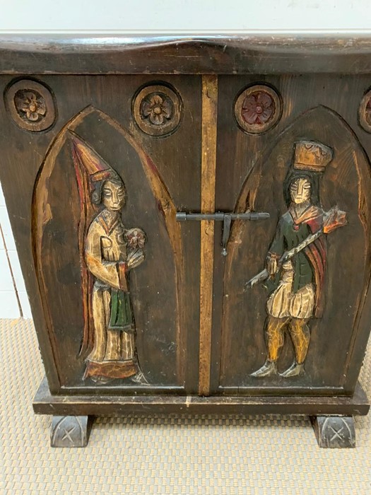 An oak two door cabinet with carved medieval style figures (H72cm W75cm D36cm) - Image 2 of 6