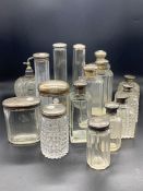 A Large Selection of Silver Topped Jars and Bottles