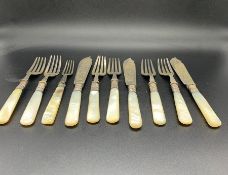A selection of Mother of pearl handled and silver mounted cutlery