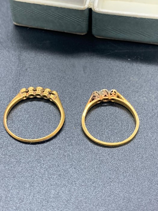 An 18 gold ring with missing stone (1.74g) and a three stone gold and platinum ring (2 g) - Image 3 of 3