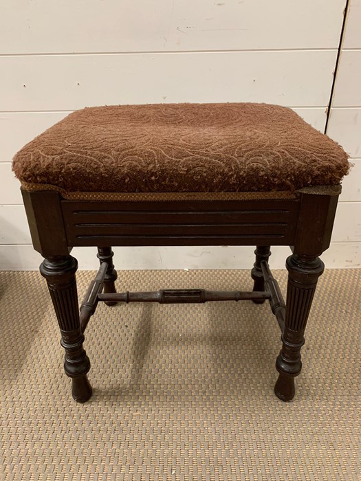 A James Shoolbred & Co Stool.