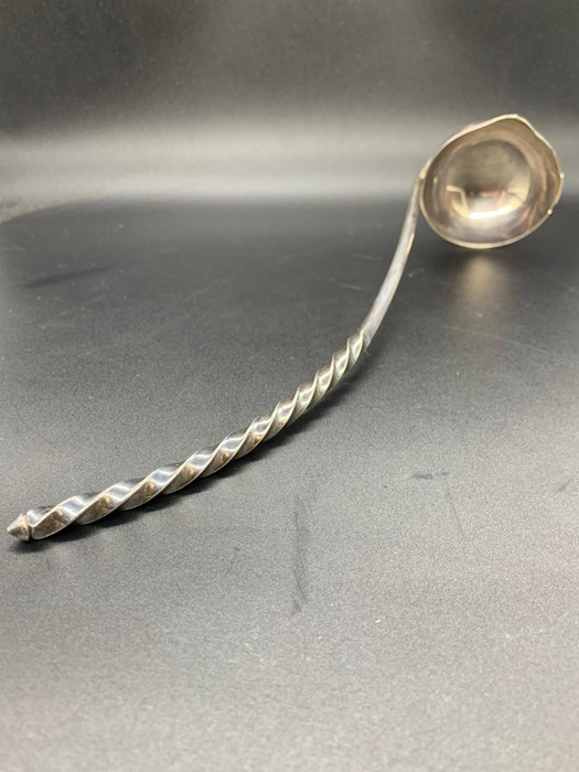 A White Metal Ladle