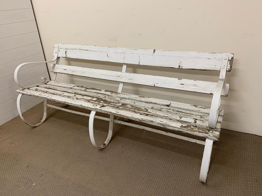 19th century Victorian garden bench with cast iron scrolled sides and wooden slats to seat and back, - Image 2 of 2