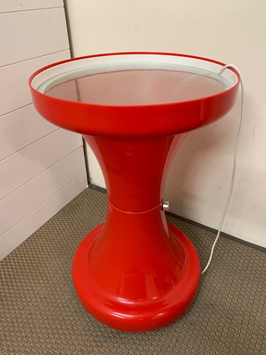 A 1970's style resin and glass topped light up table.