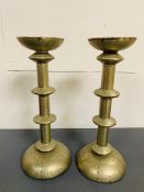 A Pair of Silver Coloured Candlesticks