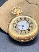 An 18 ct gold Half Hunter Pocket Watch with 9535 on dial. (Total Weight 57g)