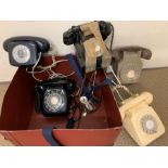 Box of vintage telephones