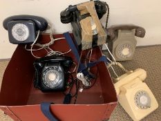 Box of vintage telephones
