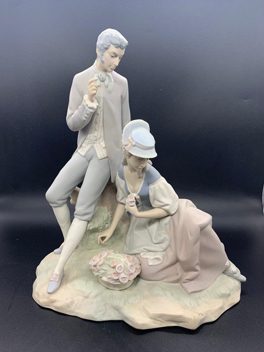 Lladro figure of a courting couple in matt AF