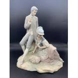 Lladro figure of a courting couple in matt AF
