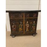 An oak two door cabinet with carved medieval style figure and two dummy drawers (AF) (H78cm W100cm